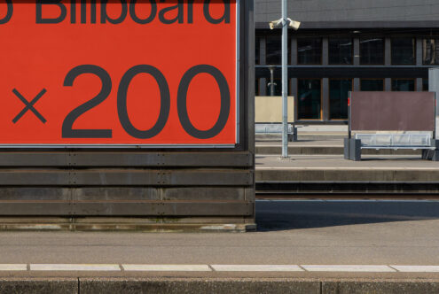 Urban billboard mockup in a street setting with clear space for designers to showcase advertising, suitable for graphics and motion design assets.